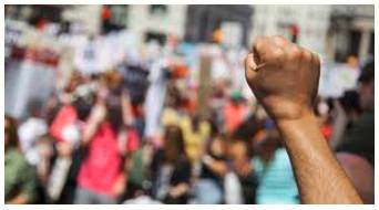 Dissident  - A person who opposes official policy, especially that of an authoritarian state.