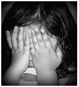 Timid  - Showing a lack of courage or confidence; easily frightened.