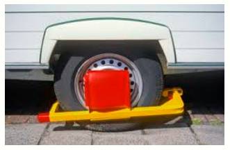Impede  - Delay or prevent (someone or something) by obstructing them.