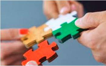 Piecemeal  - Done or happening gradually at different times and often in different ways, rather than carefully planned at the beginning.