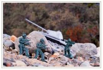 Ambush  - To make a surprise attack on somebody/something from a hidden position.