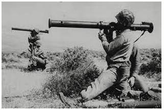 Bazooka - A short-range tubular rocket launcher used against tanks.