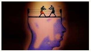 Dissonance  - Lack of agreement or harmony between people or things.