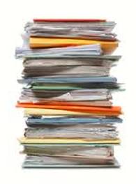 Stack  - Arrange (a number of things) in a pile, typically a neat one.
