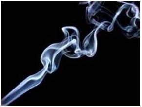 Whiff  - A trace or hint of something bad, menacing, or exciting.