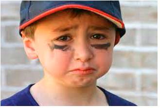 Sullen  - Bad-tempered and sulky.