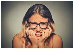 Trepidation  - A feeling of fear or anxiety about something that may happen.