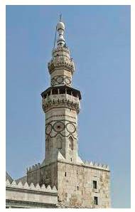 Minaret  - A slender tower, typically part of a mosque, with a balcony from which a muezzin calls Muslims to prayer.