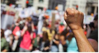 Dissident  - A person who does not agree with opinions that are officially or generally accepted.