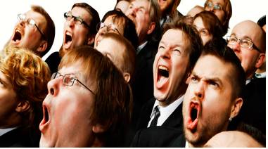 Boisterous  - Expressing your opinions or feelings in a loud and confident way.