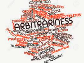 Arbitrariness - The fact of not seeming to be based on a reason, system or plan and sometimes seeming unfair.