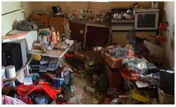 Squalor  - Dirty and unpleasant conditions.
