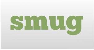 Smug  - looking or feeling too pleased about something you have done or achieved