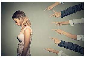 Pejorative  - A word or remark that is pejorative expresses disapproval or criticism.
