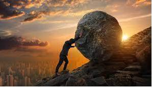 Struggling  - To try very hard to do something when it is difficult or when there are a lot of problems.