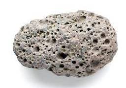 Porous - Having many small holes that allow water or air to pass through slowly.