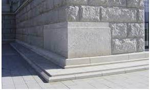 Cornerstone  - A stone at the corner of the base of a building, often laid in a special ceremony