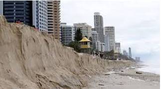Erode  - To gradually destroy the surface of something through the action of wind, rain, etc.