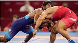 Grapple  - To try hard to find a solution to a problem.