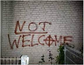Vandalize  - To damage something, especially public property, deliberately and for no good reason.