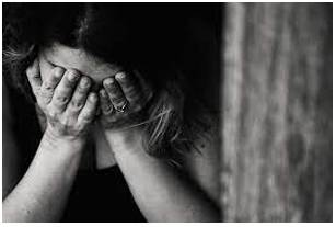 Endured  - To experience and deal with something that is painful or unpleasant without giving up.