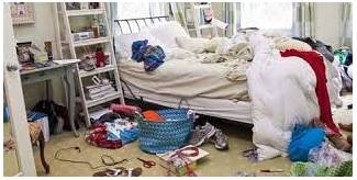 Clutter  - To fill a place or area with too many things, so that it is untidy.