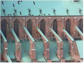 Buttress  - A structure made of stone or brick that supports a wall.