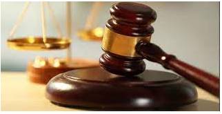 Adjudicate - To make an official decision about who is right between two groups or organizations that disagree.