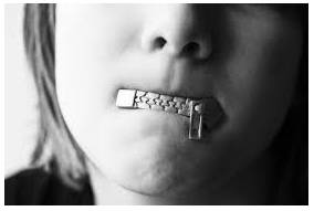 Reticence  - A dislike of telling people about things.