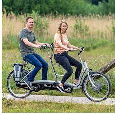 Tandem  - A bicycle for two riders, one behind the other.