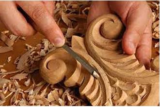 Carving - An object or design carved from a hard material as an artistic work.