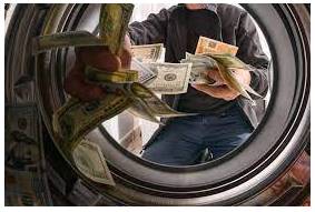 Laundering - Conceal the origins of (money obtained illegally)
