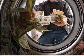 Laundering - Conceal the origins of (money obtained illegally)
