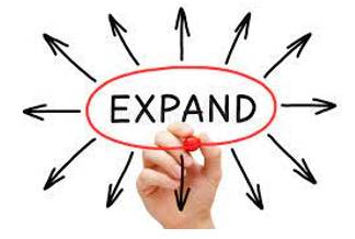 Expanded - To become or to make something bigger.