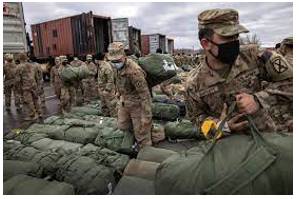 Troops - soldiers or armed forces.