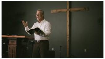 Preaching - The delivery of a sermon or religious address to an assembled group of people, typically in church.