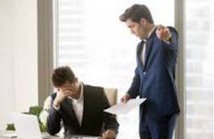 Criticizing - Indicate the faults of (someone or something) in a disapproving way.