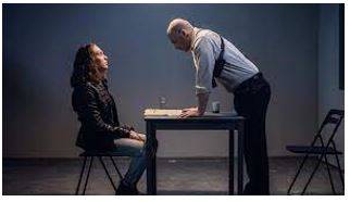 Interrogate - A process of asking someone a lot of questions for a long time in order to get information, sometimes using threats or violence