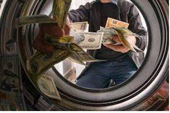 Laundering - Conceal the origins of (money obtained illegally)