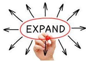 Expanded - To become or to make something bigger.