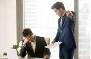 Criticized - Indicate the faults of (someone or something) in a disapproving way.