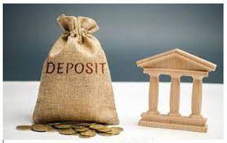 Deposited - Put or set down (something or someone) in a specific place.
