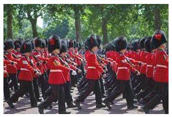 Marched - Walk in a military manner with a regular measured tread.