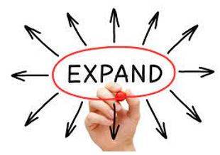 Expanded - To become or to make something bigger.