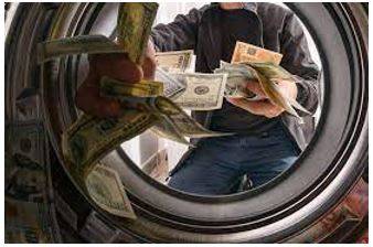 Laundering - Conceal the origins of (money obtained illegally)