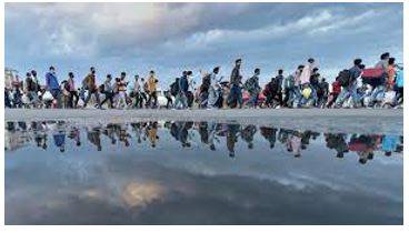 Migrant - A person who moves from one place to another, especially in order to find work or better living conditions.
