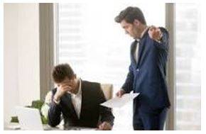 Criticized - Indicate the faults of (someone or something) in a disapproving way.