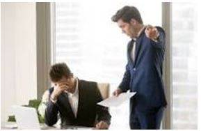 Criticized - Indicate the faults of (someone or something) in a disapproving way.