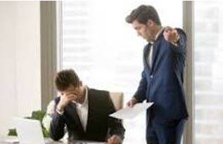 Criticized - Indicate the faults of (someone or something) in a disapproving way.