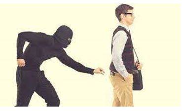 Snatching - Quickly seize (something) in a rude or eager way.